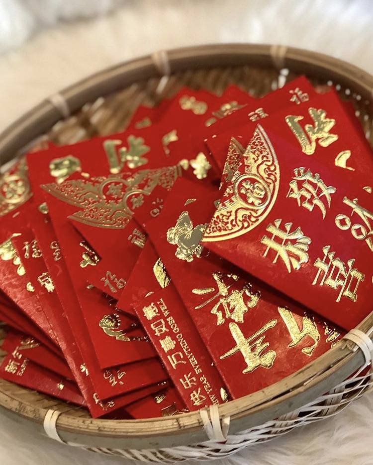 Red envelopes with gold writing 